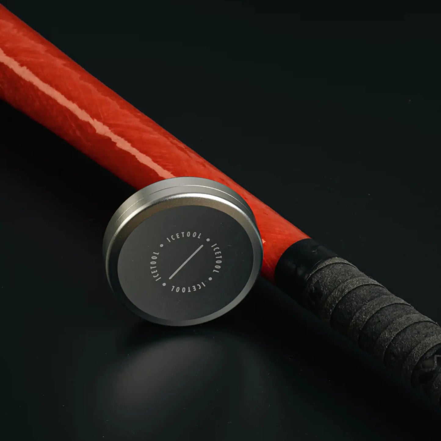 Silver aluminium refillable pouch can with Icetool branding with a red baseball bat in the background.