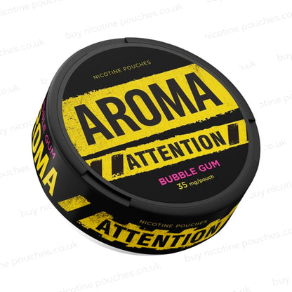 Angled shot of a black nicotine pouch container with yellow Aroma Attention Bubble Gum branding on a white background.
