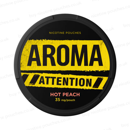 Black nicotine pouch container with yellow Aroma Attention Hot Peach branding on a white background.