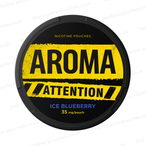 Black nicotine pouch container with yellow and blue Aroma Attention Ice Blueberry branding on a white background.