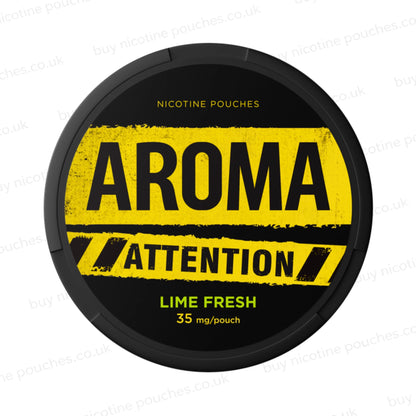 Black nicotine pouch container with yellow and green Aroma Attention Lime Fresh branding on a white background.