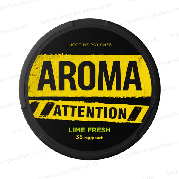 Black nicotine pouch container with yellow and green Aroma Attention Lime Fresh branding on a white background.
