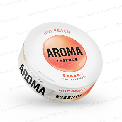 Angled shot of a white nicotine pouch container with peach-coloured Aroma Essence Hot Peach branding on a white background.