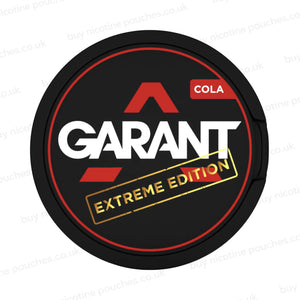 Black nicotine pouch container with red, white and gold 'GARANT EXTREME EDITION COLA' branding on a white background.