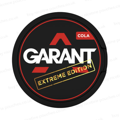 Black nicotine pouch container with red, white and gold 'GARANT EXTREME EDITION COLA' branding on a white background.