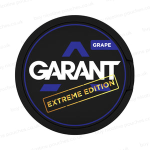 Black nicotine pouch container with purple, white and gold 'GARANT EXTREME EDITION GRAPE' branding on a white background.