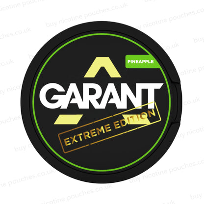 Black nicotine pouch container with green, white and gold 'GARANT EXTREME EDITION PINEAPPLE' branding on a white background.