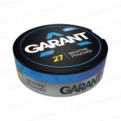 Angled shot of a black nicotine pouch container with white and blue GARANT ICE COOL branding on a white background.