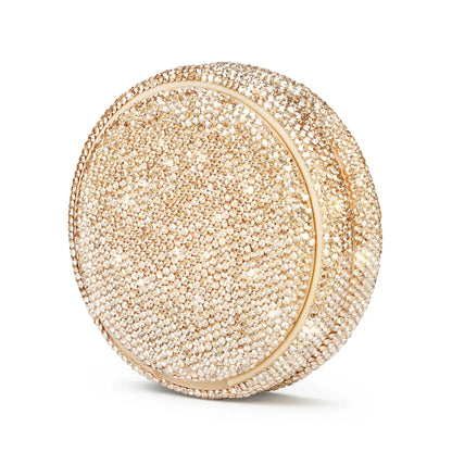Product photo of a gold nicotine pouch tub covered in rhinestones.