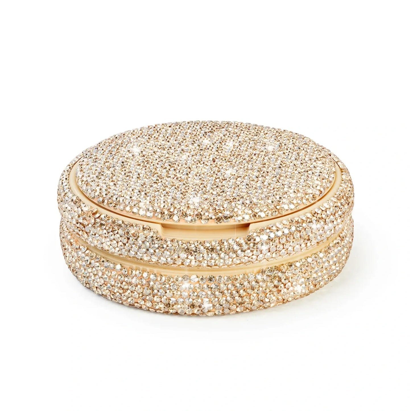 Product photo of a gold nicotine pouch tub covered in rhinestones.