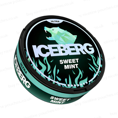 Angled shot of a nicotine pouch tub with black and green 'Iceberg Sweet Mint Ultra' branding on a white background.