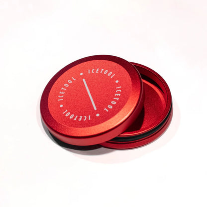 Open red circular metallic container with Icetool branding on a white background.