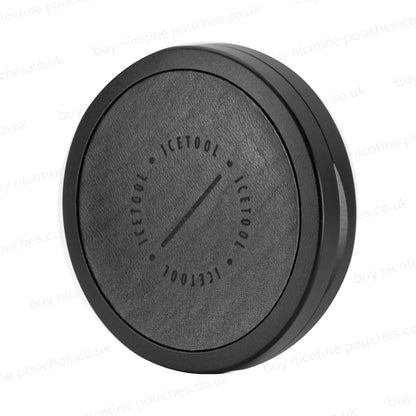 Angled shot of a black circular leather container with Icetool branding on a white background.