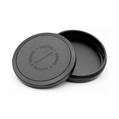 Open black circular leather container with Icetool branding on a white background.