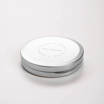 Angled shot of a silver circular container with Icetool branding on a grey background.