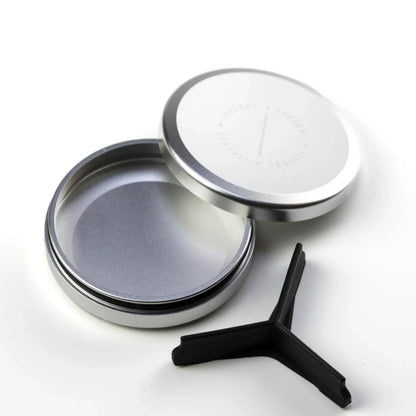 Silver metal container with lid and black silicone separator.