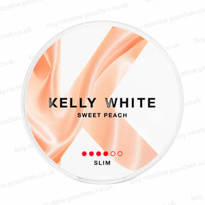 A round nicotine pouch container labeled KELLY WHITE SWEET PEACH SLIM, featuring a peach satin ribbon graphic on a white background with a clear outer rim.