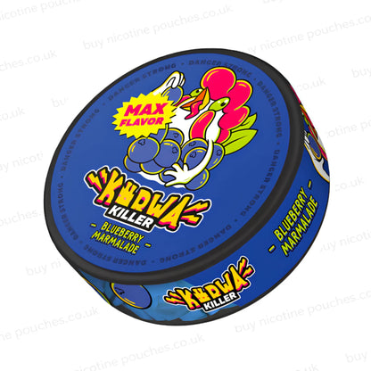 Angled shot of a nicotine pouch container featuring a cartoon chicken and blueberries on a blue background, with the text 'K#RWA KILLER' and 'BLUEBERRY MARMALADE' plus 'MAX FLAVOR'.