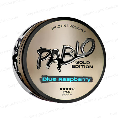 Angled shot of a nicotine pouch container with Pablo Gold Blue Raspberry branding on a white background.