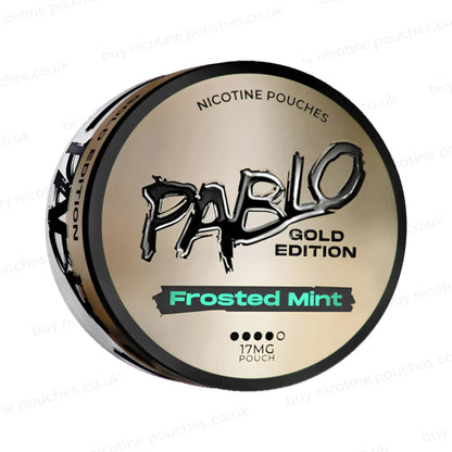 Angled shot of a nicotine pouch container with Pablo Gold Frosted Mint branding on a white background.