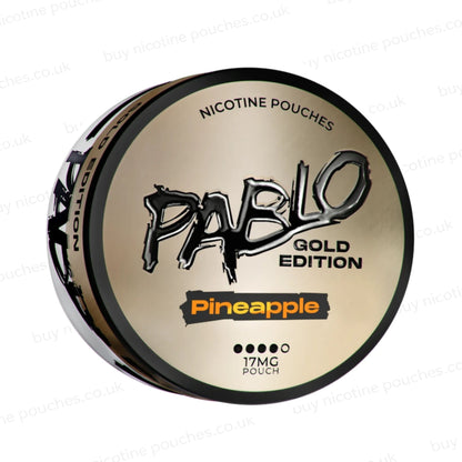 Angled shot of a nicotine pouch container with Pablo Gold Pineapple branding on a white background.