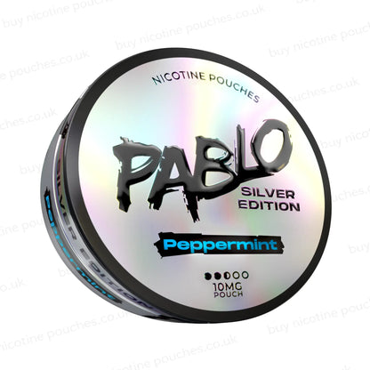 Angled shot of a nicotine pouch tub with Pablo Silver Edition Peppermint branding on a white background