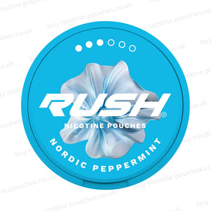 A round turquoise blue nicotine pouch can with a metallic silver flower graphic in the center, featuring the brand name 'RUSH' and the flavor 'Nordic Peppermint' on a white background with faint watermarks.