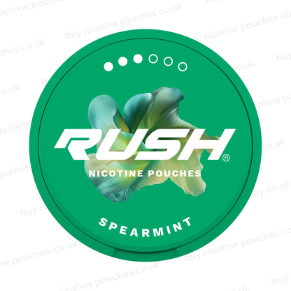 Green packaging of Rush nicotine pouches with spearmint flavor on a white background.