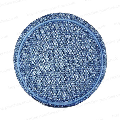 Circular container covered in blue rhinestones on a white background.