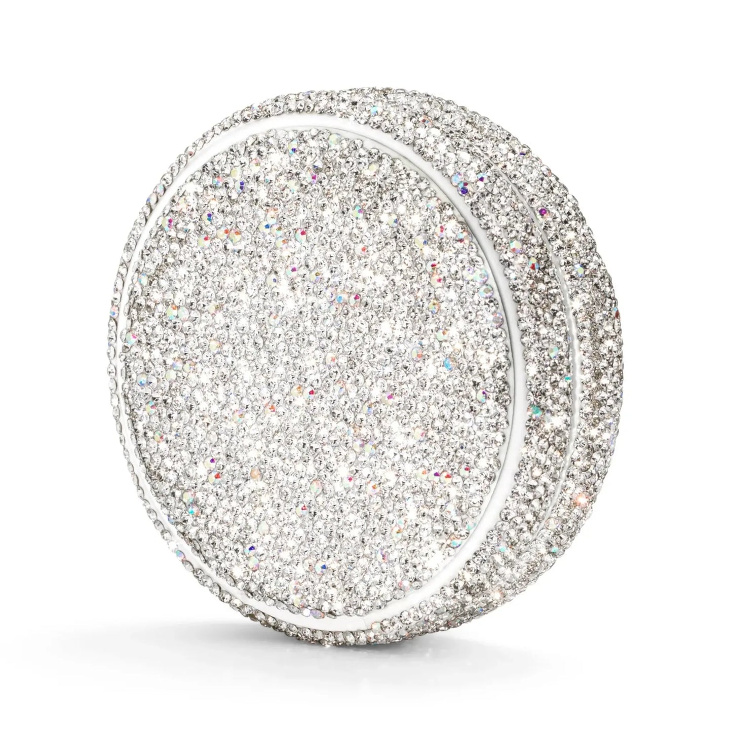 Angled shot of a circular container covered in silver rhinestones on a white background.